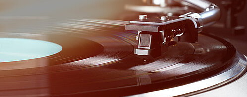 vintage turntable in action close up