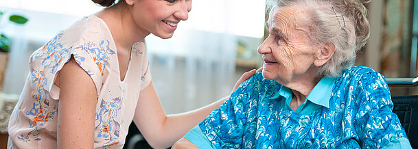 senior woman with home caregiver