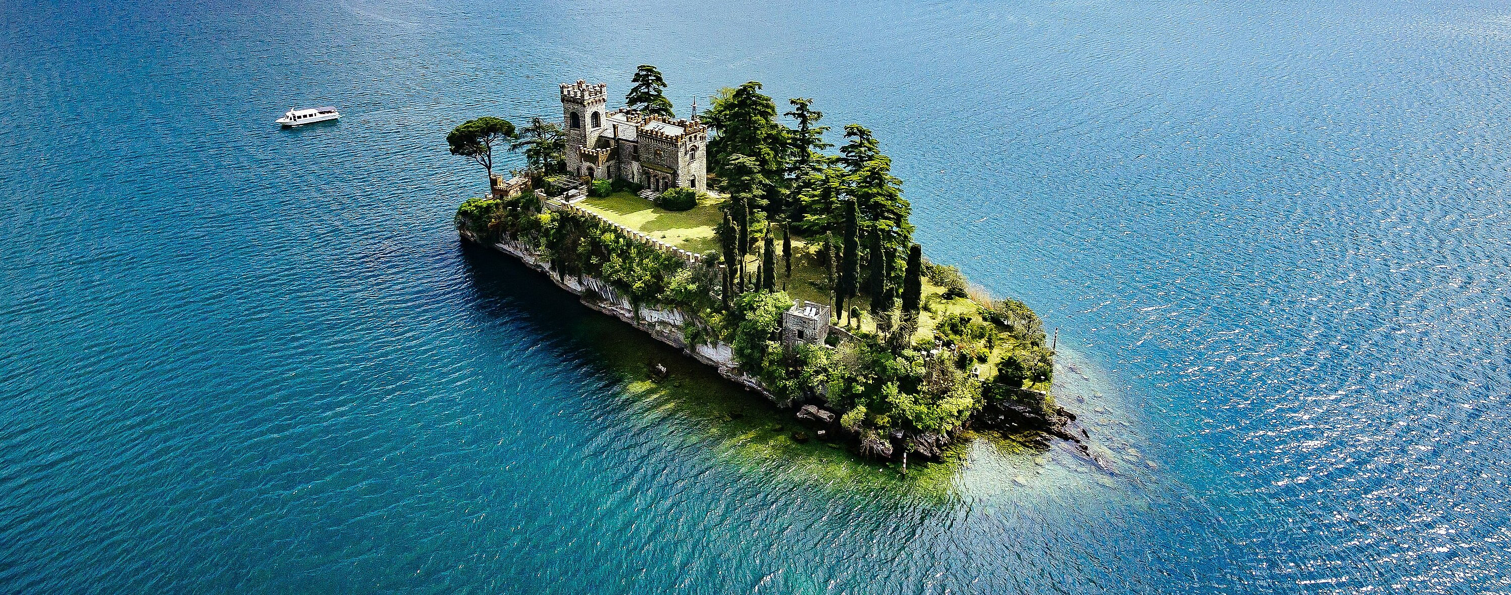 Aerial view of Loreto island, lake of Iseo in Italy.