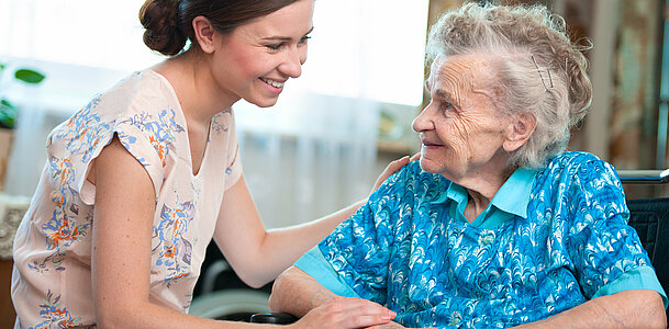 senior woman with home caregiver