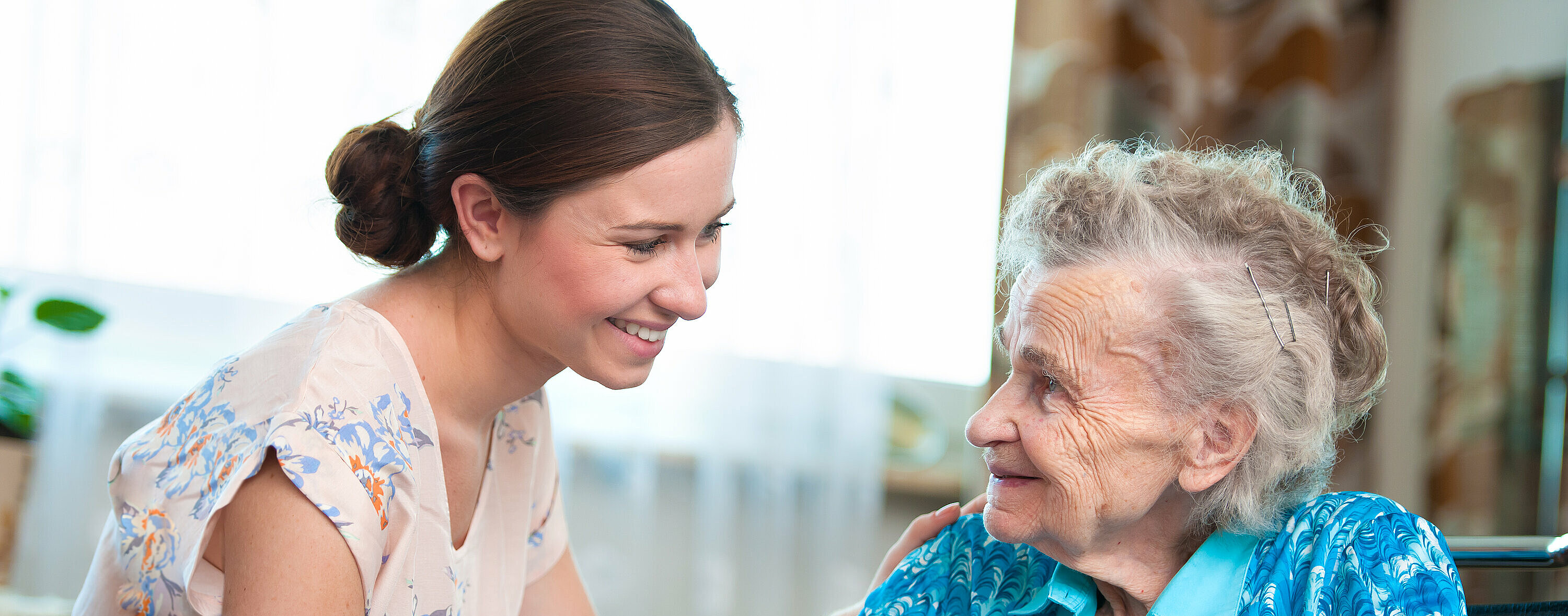 senior woman with home caregiver