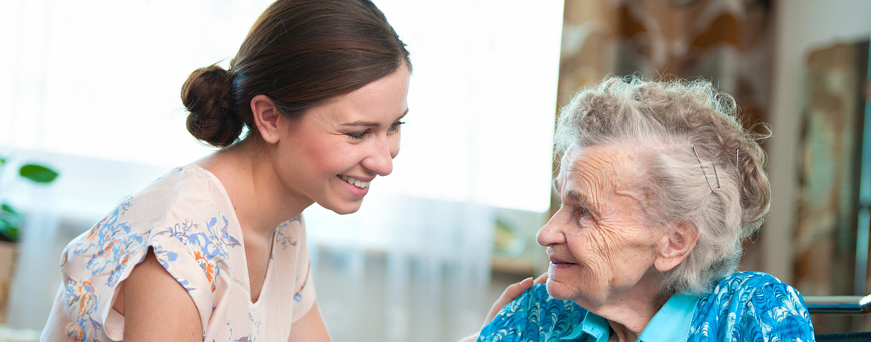 senior woman with home caregiver